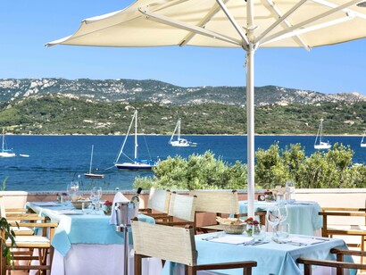 The day terrace at resort Cala di Falco in Cannigione, Italy