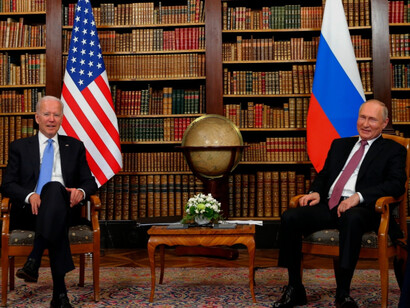 US President Joe Biden and Russian President Vladimir Putin, talking and laughing together