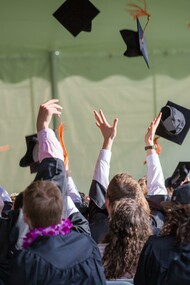 Students on graduation day, celebrating victory!
