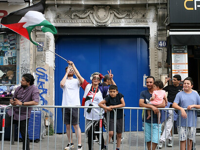 As the 2024 Olympics unfold, Ménilmontant becomes a focal point for protests, highlighting social and political tensions in the heart of Paris, France