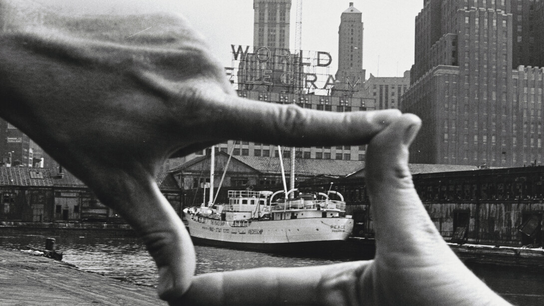 John Baldessari (American, born 1931). Hands Framing New York Harbor from Pier 18. 1971. Photograph by Shunk-Kender (Harry Shunk [German, 1924-2006] and János Kender [Hungarian, 1937-1983]). Gelatin silver print, 7 3/8 × 9 15/16″ (18.8 × 25.2 cm). The Museum of Modern Art, New York. Gift of the Roy Lichtenstein Foundation in honor of Jennifer Winkworth and Kynaston McShine and in memory of Harry Shunk and János Kender. © 2014 John Baldessari. Photograph: Shunk-Kender © J. Paul Getty Trust. The Getty Research Institute, Los Angeles