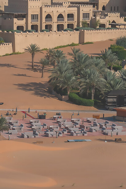 Experience the allure of an oasis amidst the desert expanse of Abu Dhabi, UAE, providing a serene escape in the heart of the arid environment
