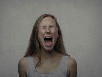 The girl screaming to be heard