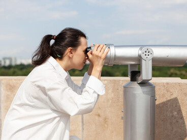 Close-range observation through a fixed binocular viewer emphasizes the importance of direct visual confirmation alongside sensor data in UAP research