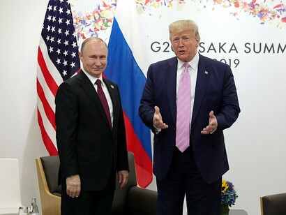 In 2019, Russian President Vladimir Putin holds a meeting with U.S. President Donald Trump