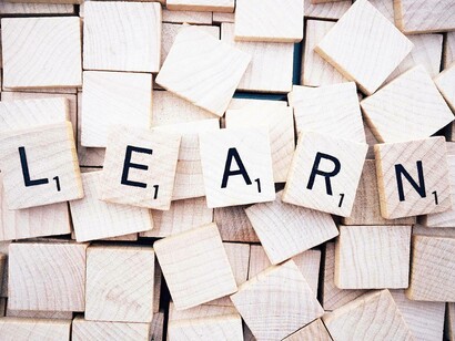 Tiles that spell out "learn" which is quite apt given the negligence that causes us to mispronounce words