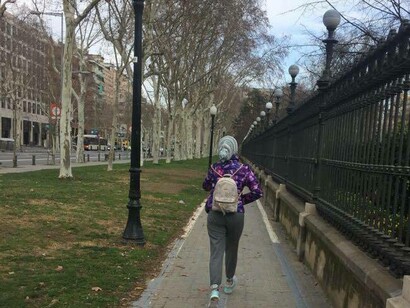 Hiba walking on Las Ramblas Street in Barcelona, Spain