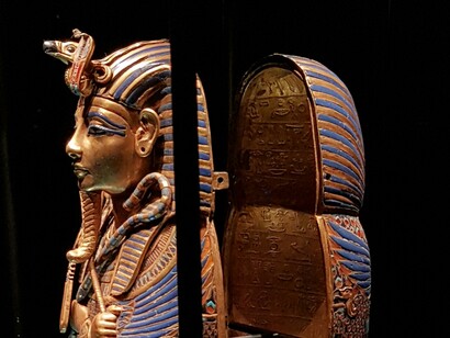 Gold inlaid canopic coffinette shrine of Tutankhamun with visible interior dedication to Imseti and Isis