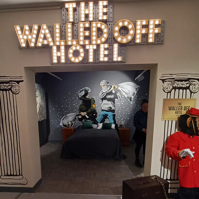 Full-sized reproduction of Banksy’s “The Walled Off Hotel,” created in
Bethlehem, West Bank — photograph by Quique Kierszenbaum/The Guardian. The
Walled Off Hotel is an immersive art installation and boutique hotel and originally
opened in March 2017. Credit: © Banksy / Pest Control Office
