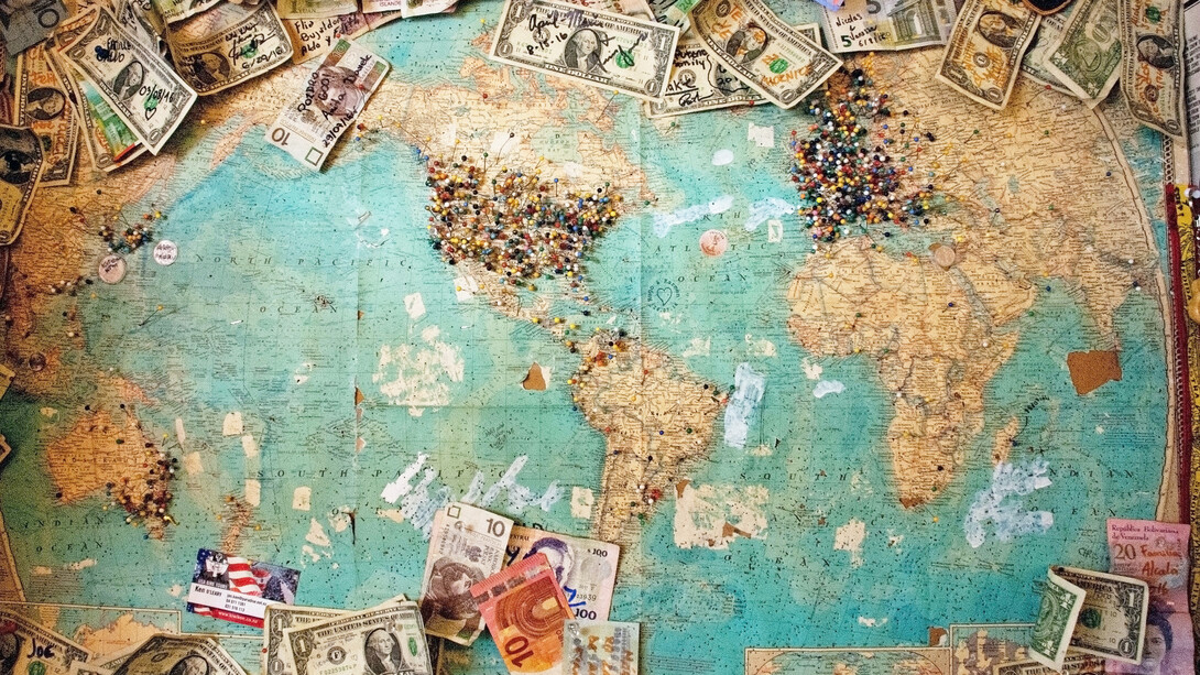 A map of the world, with pins located in areas of US and Europe in higher concentration