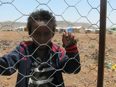 Bambino in un campo profughi eritrei, Khartum, Sudan