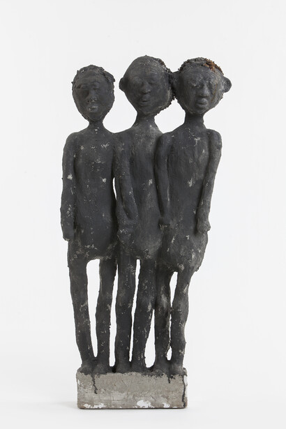 Three Children, c. 1985-c. 1999; concrete, paint, and mixed media; 37 x 16 3/4 6 in. John Michael Kohler Arts Center Collection, gift of Kohler Foundation Inc. Photo courtesy of John Michael Kohler Arts Center