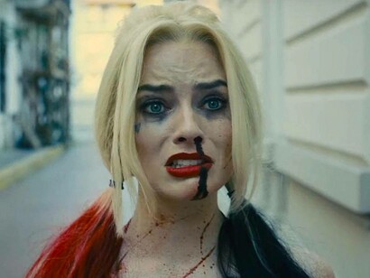 Harley Quinn played by Margot Robbie in a scene where she's looking disturbed