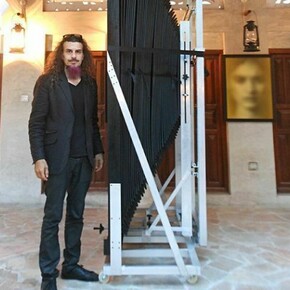Artist Halim Al Karim with his custom camera. Courtesy of the artist and Robischon Gallery.