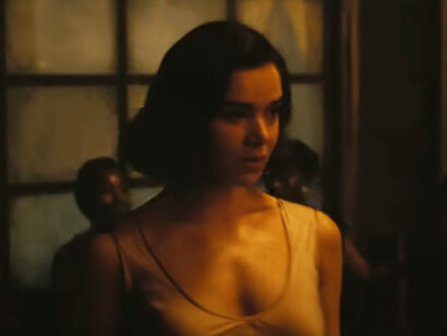 Hailee Steinfeld commands the frame with a regal stillness in Sinners, her presence foreshadowing the deep truths and shifts her character will drive in the Southern Gothic tale
