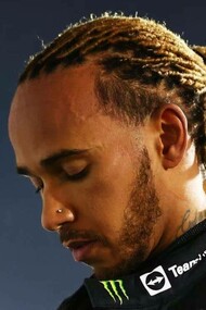 Lewis Hamilton bowed his head in reflective disappointment
