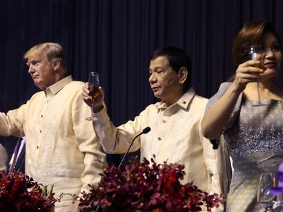 President Rodrigo Roa Duterte raises a toast during the gala dinner hosted by the Philippines for ASEAN leaders and dialogue partners at the SMX Convention Center in Pasay City on November 12, 2017