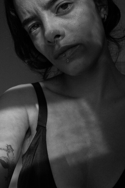 Woman looking at the camera with anger
