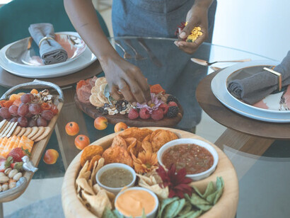 A woman arranging wine table