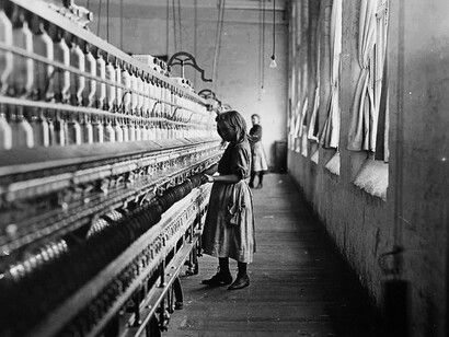 Sadie Pfeifer, 48 inches tall, has worked for six months at the Lancaster Cotton Mills. One of the many young children employed in the mills, November 1908