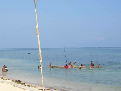 People enjoying the summer sun in Patar Beach, Pangasinan, Philippines