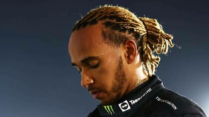 Lewis Hamilton bowed his head in reflective disappointment