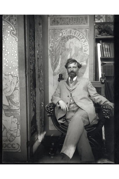 Alphonse Mucha shown with posters for
Sarah Bernhardt in his studio, c. 1901, Gelatin silver print © Mucha Trust 2015