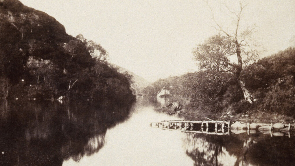 William Henry Fox Talbot
English, 1800–1877
Loch Katrine (Loch Katrine Pier, Scene of the Lady of the Lake), Plate XI from Sun Pictures in Scotland
1844 (published 1845)
Salted paper print
Image: 6 ¾ x 8 5/16 in. (17.1 x 21.1 cm); sheet: 7 ¼ x 9 1/16 in. (18.4 x 23.0 cm)
Sidney and Lois Eskenazi Museum of Art