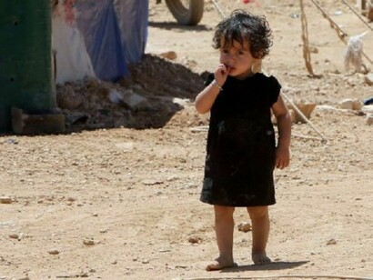 A little girl, confused