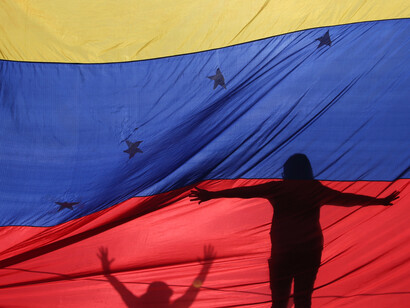 People of Venezuela, under their flag