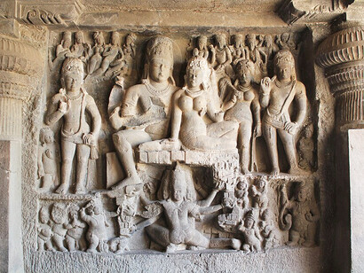 Ellora, Cave 16, which depicts Ravana shaking Mount Kailasa, belongs to the Ellora archaeological complex in Maharashtra, India, created during the Rashtrakuta dynasty and known for its monumental rock-cut architecture
