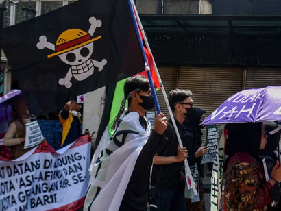 During the 2025 protests in Indonesia, demonstrators raised the One Piece Jolly Roger, with Straw Hat Pirates flags appearing in the crowds as a symbol of resistance, Indonesia
