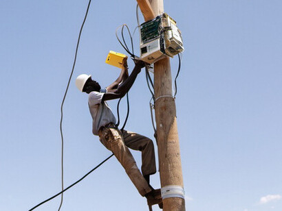 Electricians work tirelessly to install internet poles in rural Africa, aiming to bring much-needed connectivity to underserved communities