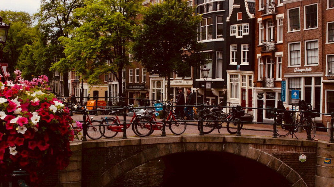Amsterdam's bike-friendly ethos shines through its picturesque canals and bustling streets
