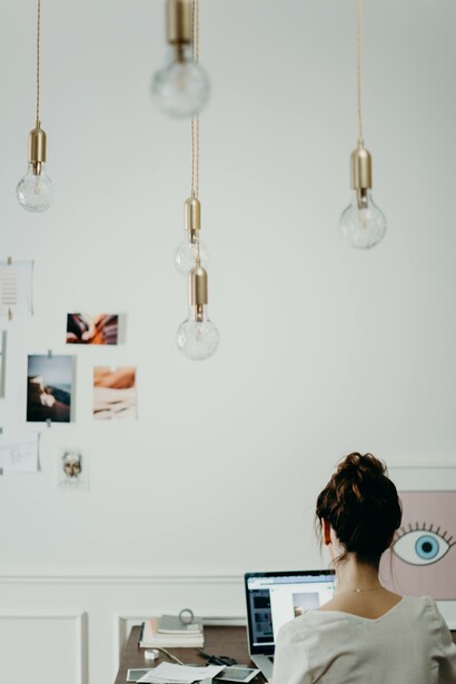 A woman in her studio, in front of her desk.In Europe, 4 out of 44 countries have 
recorded a social media ban, and the four countries are all from the East of the continent, whereas the western nations have tried to maintain clean records