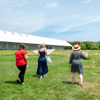 Guests participating in the installation of Wishing the mountains madness 1977 / 2026 during Community Day at the Parrish Art Museum. Courtesy of Parrish Art Museum