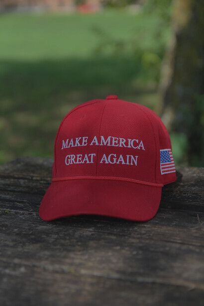 A red hat that says make america great again