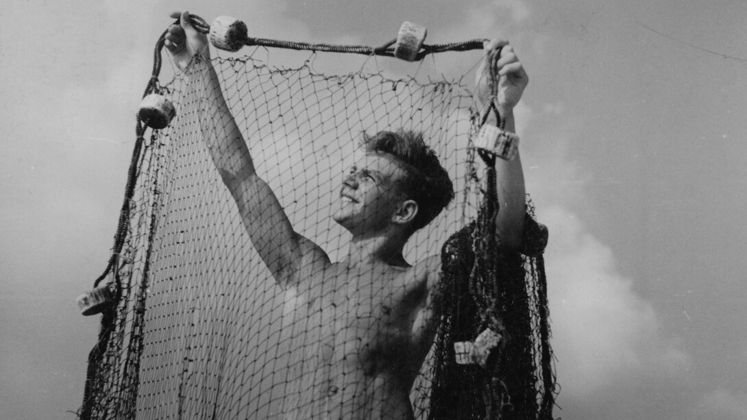Keith Vaughan, Boy Holding up Fishing Net, 1939 © the estate of Keith Vaughan, Courtesy of Austin / Desmond Fine Art

