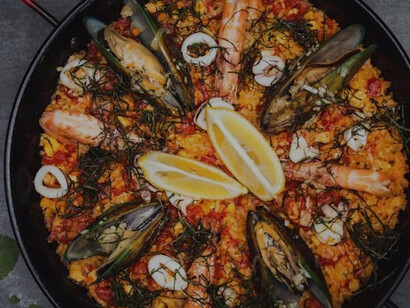 Culinary delights of Spain as you indulge in our mouthwatering offering of cooked shrimps with rice, a quintessential Mediterranean dish that captures the essence of Spain's rich gastronomic heritage