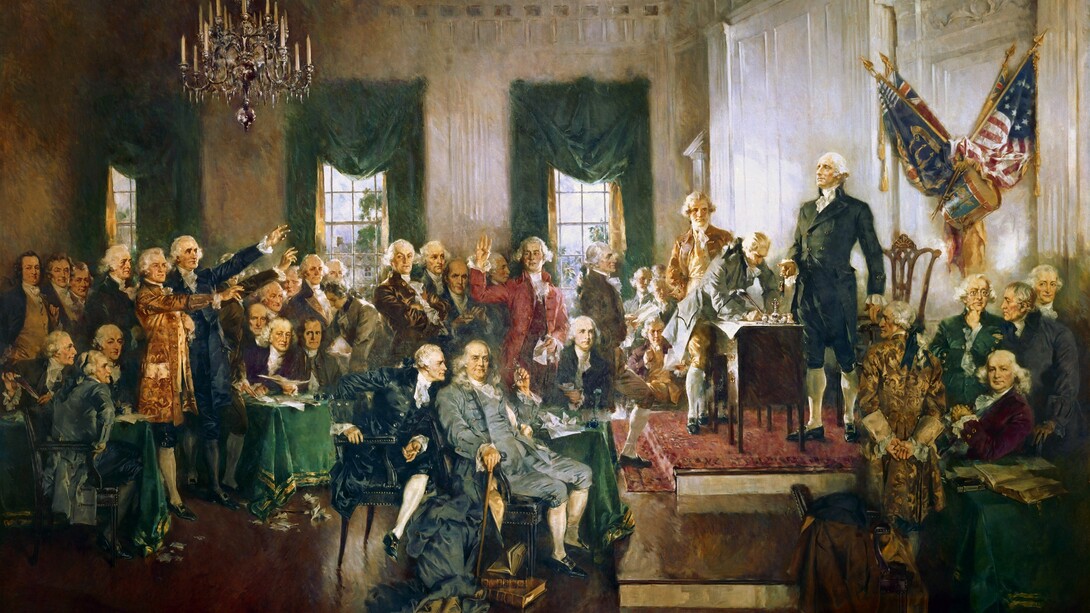 La filosofía política de Montesquieu influyó en los colonos norteamericanos: «Escena de la firma de la Constitución de los Estados Unidos» (1940), Howard Chandler Christy