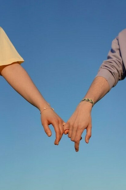 Hands joined in gestures symbolizing friendship