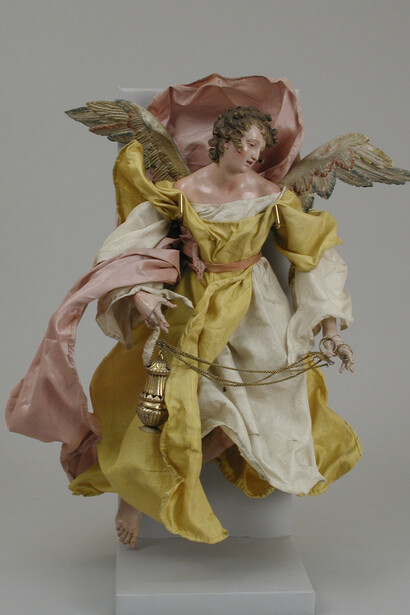 Maker:Attributed to Giuseppe Sanmartino (Italian, 1720–1793)
Date:second half 18th century
Culture:Italian, Naples
Medium:Polychromed terracotta head; wooden limbs and wings; body of wire wrapped in tow; various fabrics
Dimensions:H. 14 1/4 in. (36.2 cm.)
Classification:Crèche
Credit Line:Gift of Loretta Hines Howard, 1964