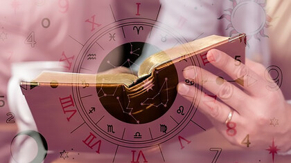 A man holding a history book contemplates the intriguing relationship between astronomy, numerology, and historic events, exploring the intersection of celestial patterns and human history