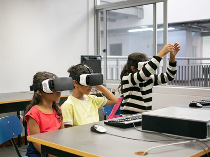 A group of diverse children wearing VR headsets, showcasing the integration of AI in smart classrooms