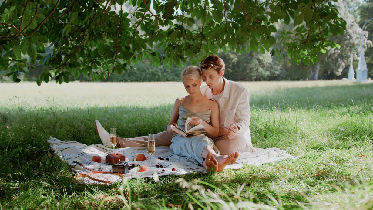 With hearts racing and minds swirling, the man and the woman navigate the exhilarating highs and lows that come with falling in love, wondering what it all means