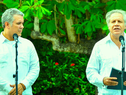 Duque con Luis Almagro, secretario general de la OEA que ha desempeñado un papel activo e la legitimación de Guaidó