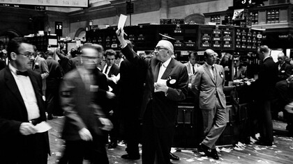 Stockbrokers working on the trading floor of the New York Stock Exchange, a global symbol of American market capitalism. September 23, 1963