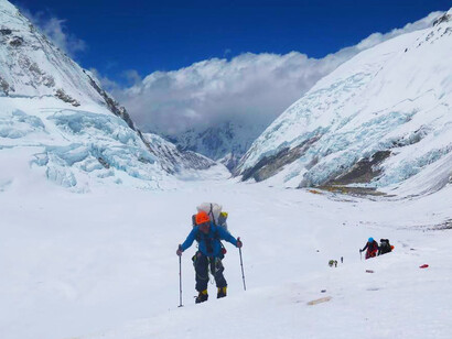 Mountaineers reaching the summit of a peak in Nepal’s majestic Himalayas