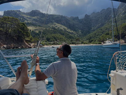 A man on a boat in Mallorca on the sea