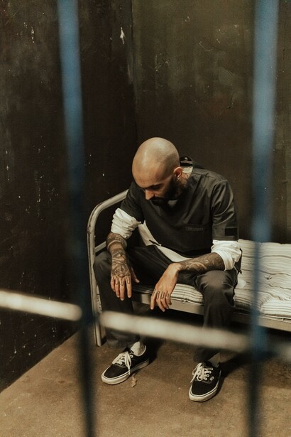 Man sitting in a cell